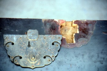 Detail of lockplate needing repairs